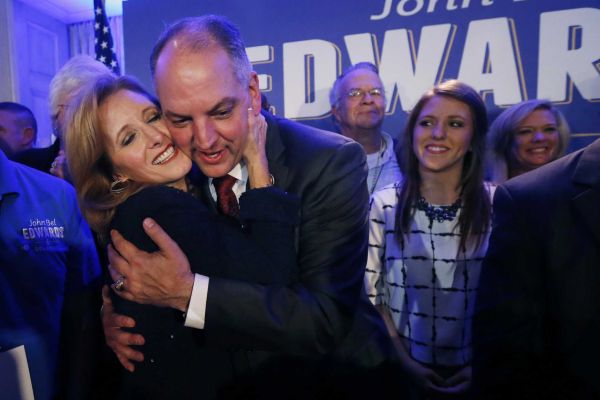 Louisiana Gov.-elect John Bel Edwards hugs his wife