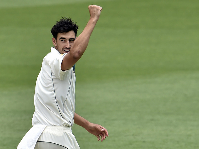 Australia's paceman Mitchell Starc celebrates the last wicket of New Zealand's Trent Boult