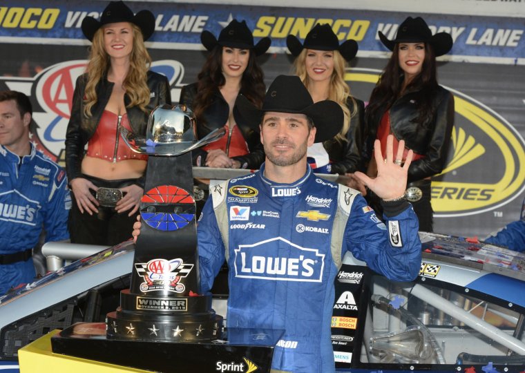 Jimmie Johnson celebrates in Victory Lane after winning at Texas Motor Speedway on Sunday Nov. 8 2015