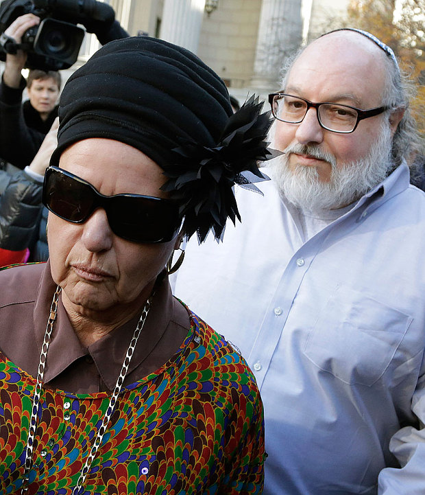 Jonathan Pollard and his wife Esther leave the federal courthouse