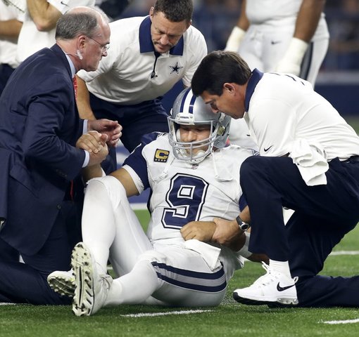 Tony Romo leaves Panthers game with injury