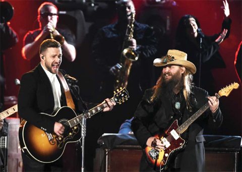 Justin Timberlake left and Chris Stapleton perform on stage