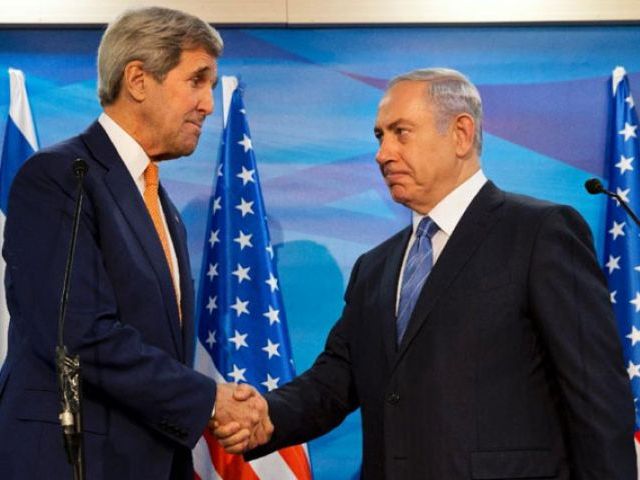 Israeli Prime Minister Benjamin Netanyahu and US Secretary of State John Kerry shake hands before their meeting in Jerusalem