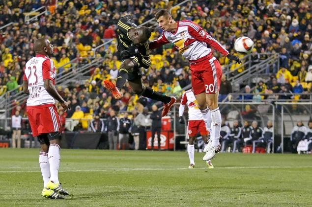 Columbus Crew's Kei Kamara heads the ball away from the Red Bulls&#39 Matt Miazga in Sunday's conference finals game