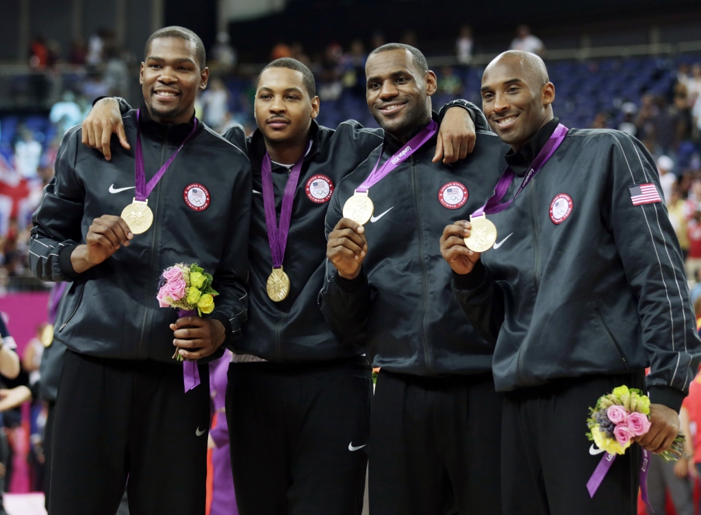 United States Kevin Durant Carmelo Anthony Le Bron James and Kobe Bryant celebrate the men's gold medal basketball game at the 2012 Summer Olympics in London