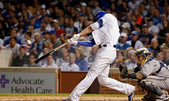 CHICAGO IL- SEPTEMBER 22 Kris Bryant #17 of the Chicago Cubs hits a two-run home run against the Milwaukee Brewers in the third inning at Wrigley Field