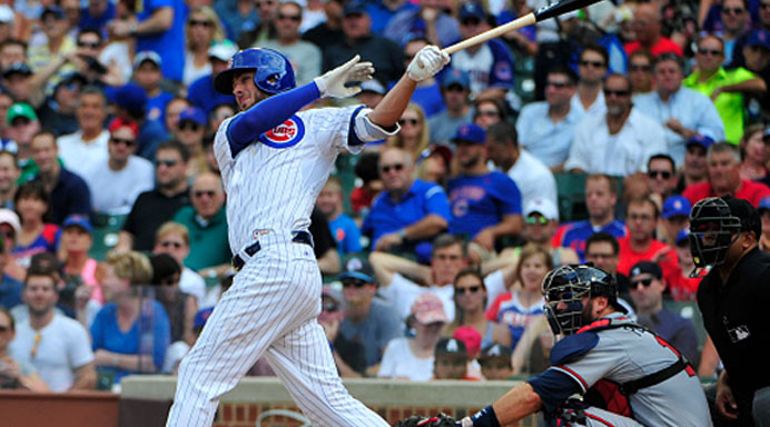 Kris Bryant of the Chicago Cubs hits an RBI double against the Atlanta Braves during the sixth inning