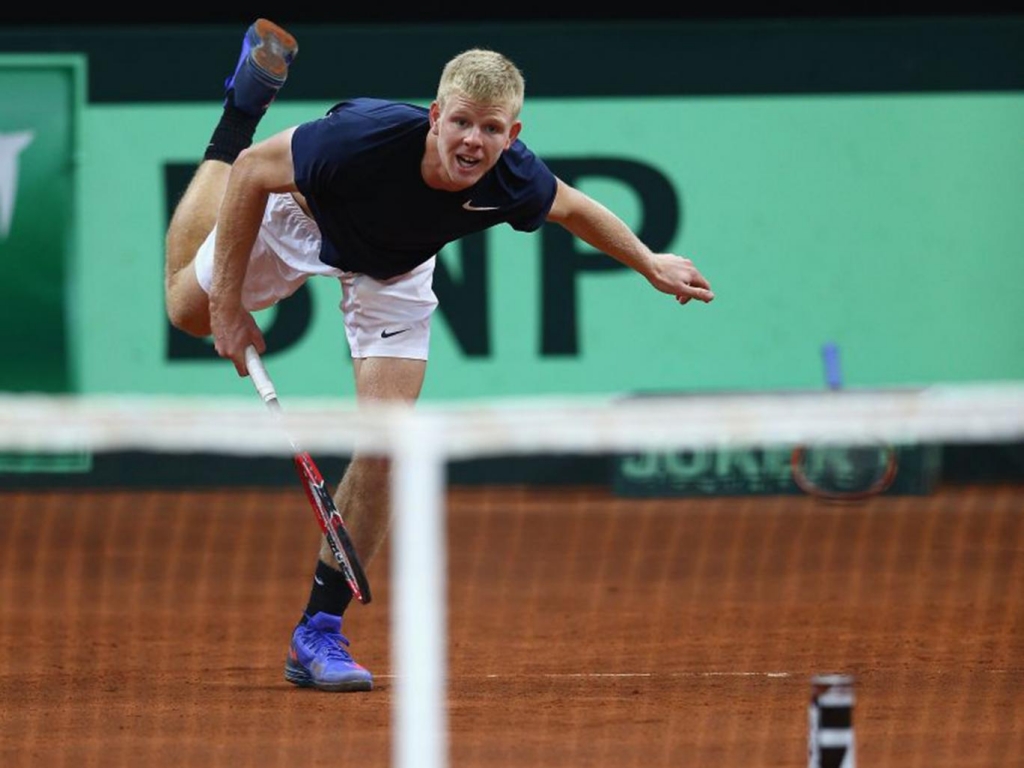 Kyle Edmund serves during practice in Ghent Getty