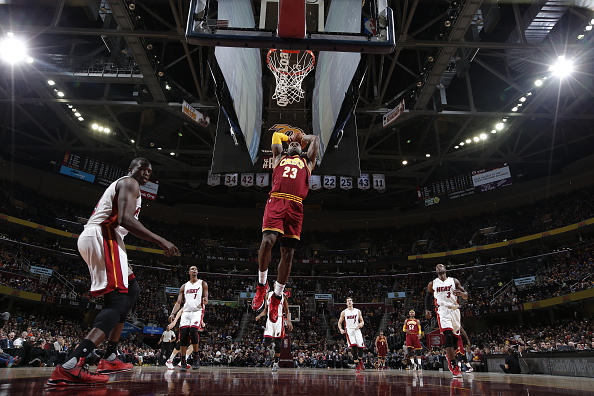 LeBron James of the Cleveland Cavaliers goes to the basket against the Miami Heat on Oct. 30