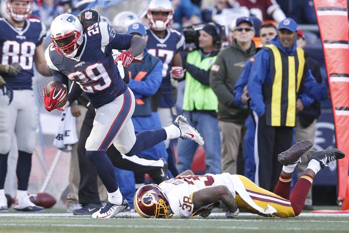 Nov 8 2015 Foxborough MA USA New England Patriots running back Le Garrette Blount escapes the grasp of Washington Redskins free safety Dashon Goldson during the third quarter at Gillette Stadium. The New England Patriots won 27-10. Mandatory