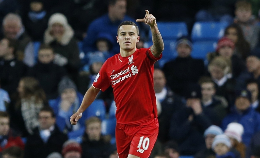 Philippe Coutinho celebrates scoring the second goal for Liverpool during Premier League game against Manchester City at Etihad Stadium