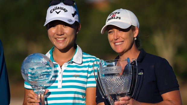 Lydia Ko left and Cristie Kerr hold their trophies