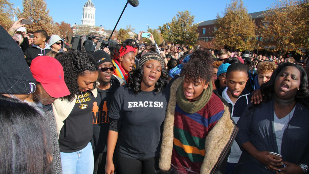 Students singing'we shall overcome in the moments directly following Tim Wolfe's resignation. The group Concerned Student 1950 were joined by hundreds of faculty staff and students in a walkout this morning