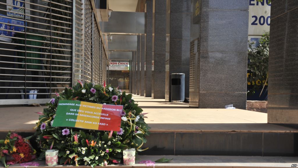 Flowers have been laid at the entrance the Radisson Blu hotel in Bamako on Nov. 24 2015 in tribute to the victims four days after the deadly terrorist attack that left 27 people killed
