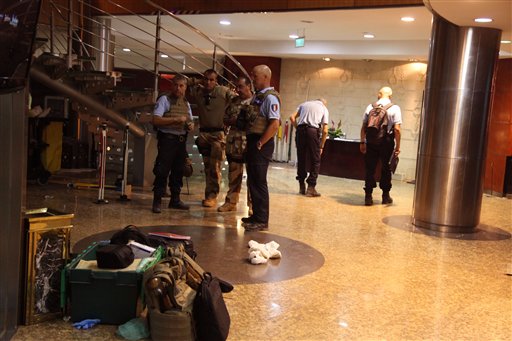 French troops rear inside the Radisson Blu hotel after an attack by gunmen on the hotel in Bamako Mali Friday Nov. 20 2015. Islamic extremists armed with guns and grenades stormed the luxury Radisson Blu hotel in Mali's capital Friday morning