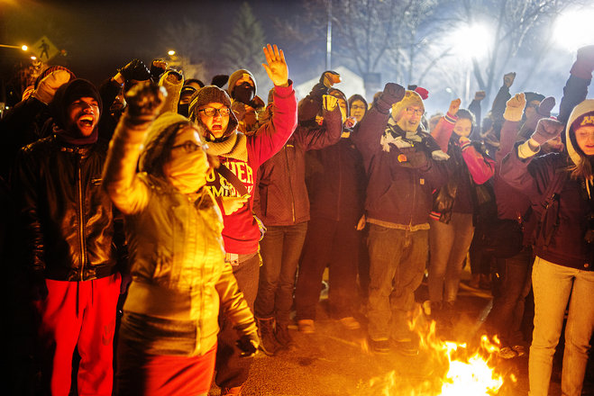 At the 4th Precinct in North Minneapolis protesters demanded answers over the death of Jamar Clark who was shot and killed by police. Civil rights leaders appealed Thursday Nov. 19 2015 for Minneapolis police to exercise restraint but the head of the