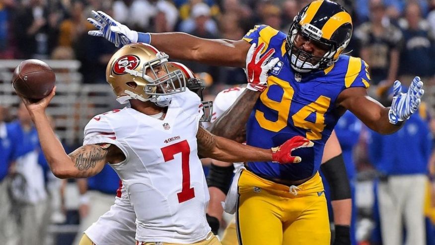 Nov 1 2015 St. Louis MO USA St. Louis Rams defensive end Robert Quinn pressures San Francisco 49ers quarterback Colin Kaepernick during the first half at the Edward Jones Dome. Mandatory Credit Jasen Vinlove-USA TODAY Sports