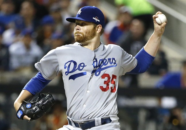 Los Angeles Dodgers starting pitcher Brett Anderson delivers in the first inning during baseball's Game 3 of the National League Division Series against the New York Mets in New York. Anderson Houston outfielder