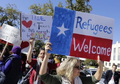 Members of The Syrian People Solidarity Group protest in Austin Texas on Sunday