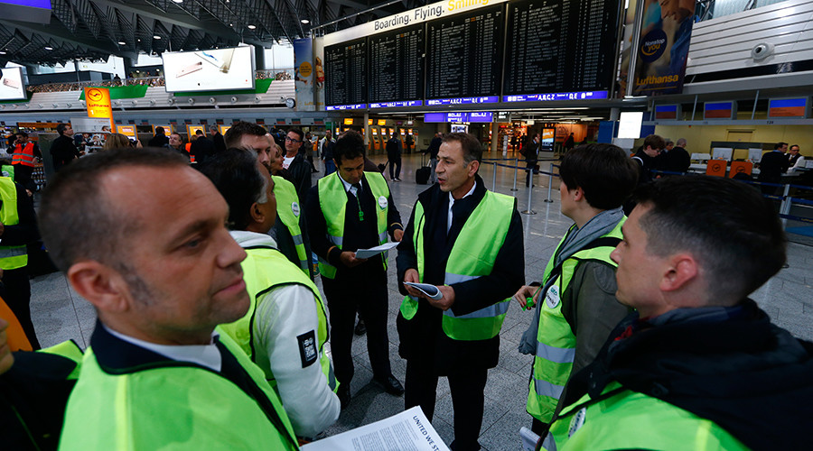 Members of cabin crew union UFO stand during a strike in Frankfurt airport Germany