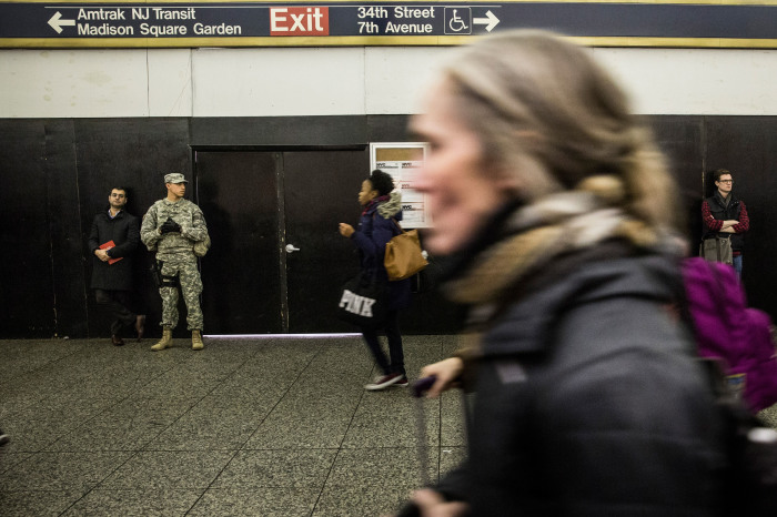 Members of the U.S. National Guard watch over Thanksgiving travelers at Penn Station on Nov. 25 2015 in New York.
Andrew Burton  Getty Images  AFP