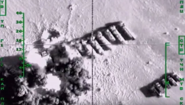 Military footage of Russian airstrikes hitting an Islamic State group fuel convoy