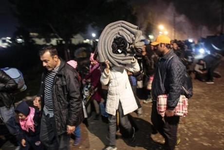 Migrants from Syria waited in line to cross the border near the northern Greek village of Idomeni