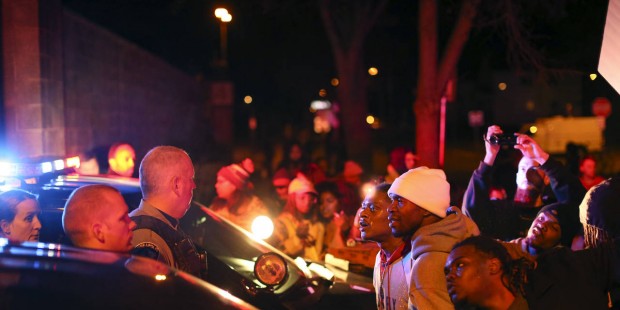 The Latest: Protesters gather at Minneapolis police precinct