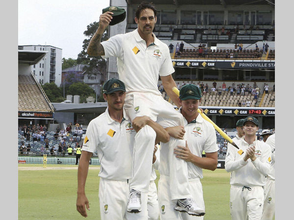 Mitchell Johnson is chaired off the ground by team-mates Mitchell Starc and Josh Hazlewood after completing in his final test in the cricket test match against New Zealand in Perth Australia Tuesday November 17