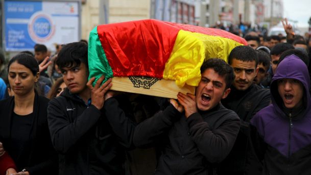 Mourners carry the coffin of Yakup Sinbag a civilian killed in Silvan Turkey during clashes with Kurdish