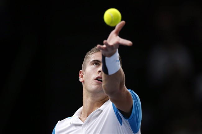 Borna Coric of Croatia serves the ball to Britain's Andy Murray during their second round match of the BNP Masters tennis tournament at the Paris refurbished Bercy Arena in Paris France Wednesday Nov. 4 2015