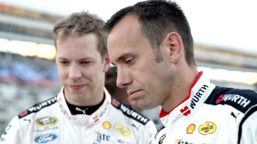 FORT WORTH TX- NOVEMBER 08 Brad Keselowski, driver of the #2 Wurth Ford talks to crew chief Paul Wolfe after placing second behind Jimmie Johnson driver of the #48 Lowe's Chevrolet during the NASCAR Sprint Cup Series AAA Texas 500 at Texas