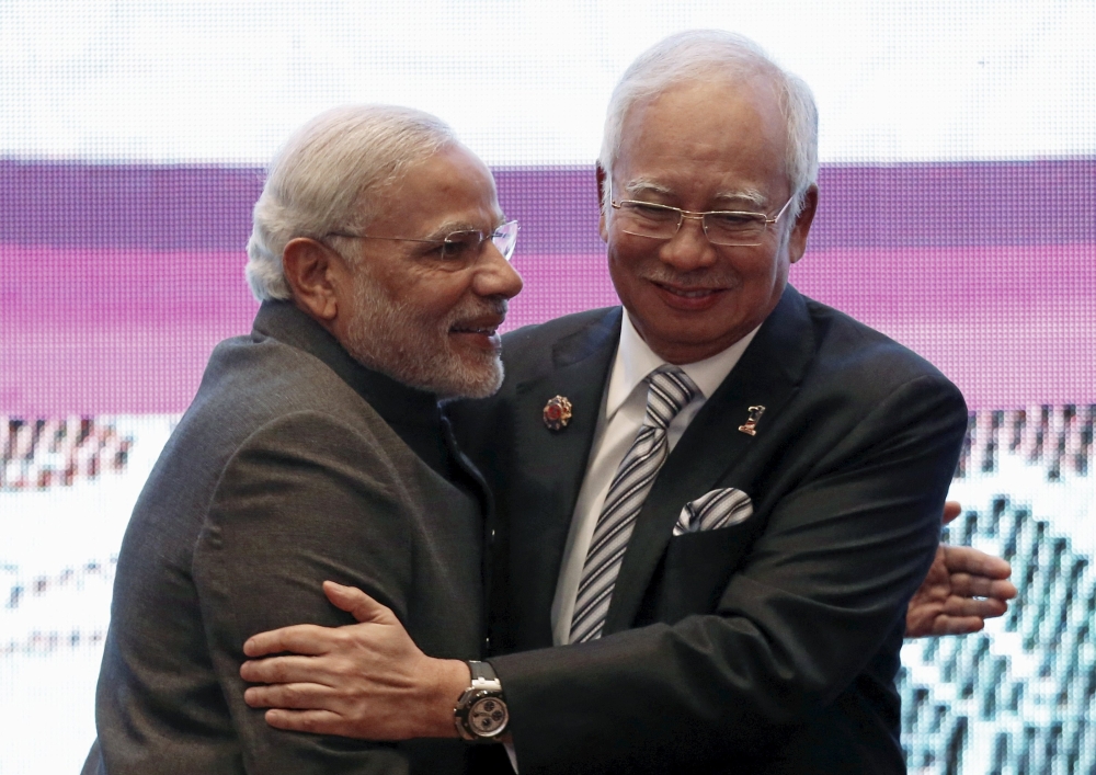 Narendra Modi greeted by Datuk Seri Najib Razak at the 27th Asean Summit in Kuala Lumpur on Saturday. – Reuters pic