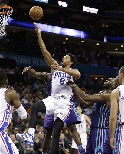 20 2015 Philadelphia 76ers Jahlil Okafor slips through the lane and past a host of Charlotte Hornets as he scores in the second half of an NBA basketball game in Charlotte N.C. Boston police say they do not plan