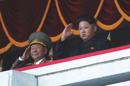 North Korean leader Kim Jong Un salutes at a parade in Pyongyang