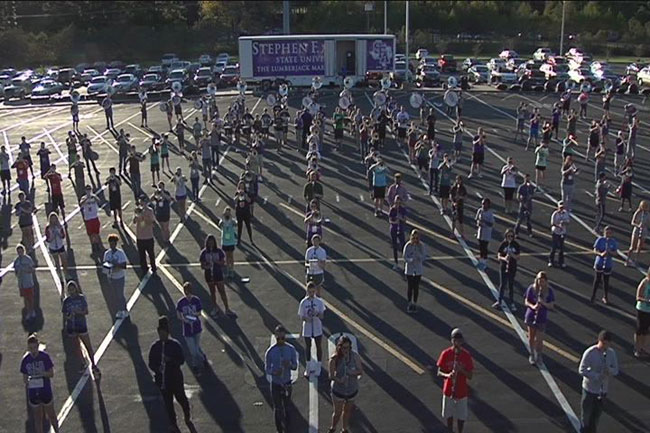 SFA Lumberjack Marching Band conducts one last practice in Nacogdoches before leaving for a performance in the Macy’s Thanksgiving Day Parade