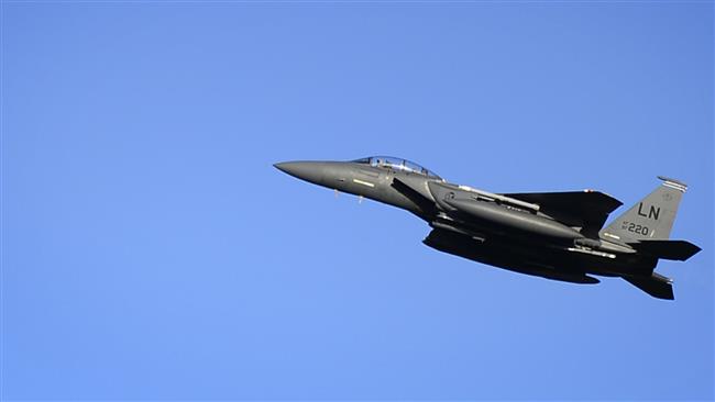 In this image released by the US Air Force, an F-15E Strike heads to support 'Operation Inherent Resolve&#39 in Iraq and Syria