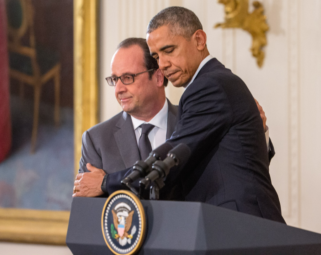 President Barack Obama and French President Francois Hollande embrace during a joint news conference in the East Room of the White House in Washington Tuesday Nov. 24 2015