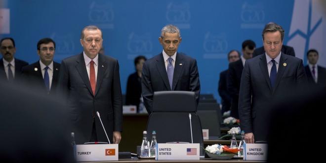 President Barack Obama President Recep Tayyip Erdoğan of Turkey and Prime Minister David Cameron of the United Kingdom observe a moment of silence for the victims of the terrorist attacks in France