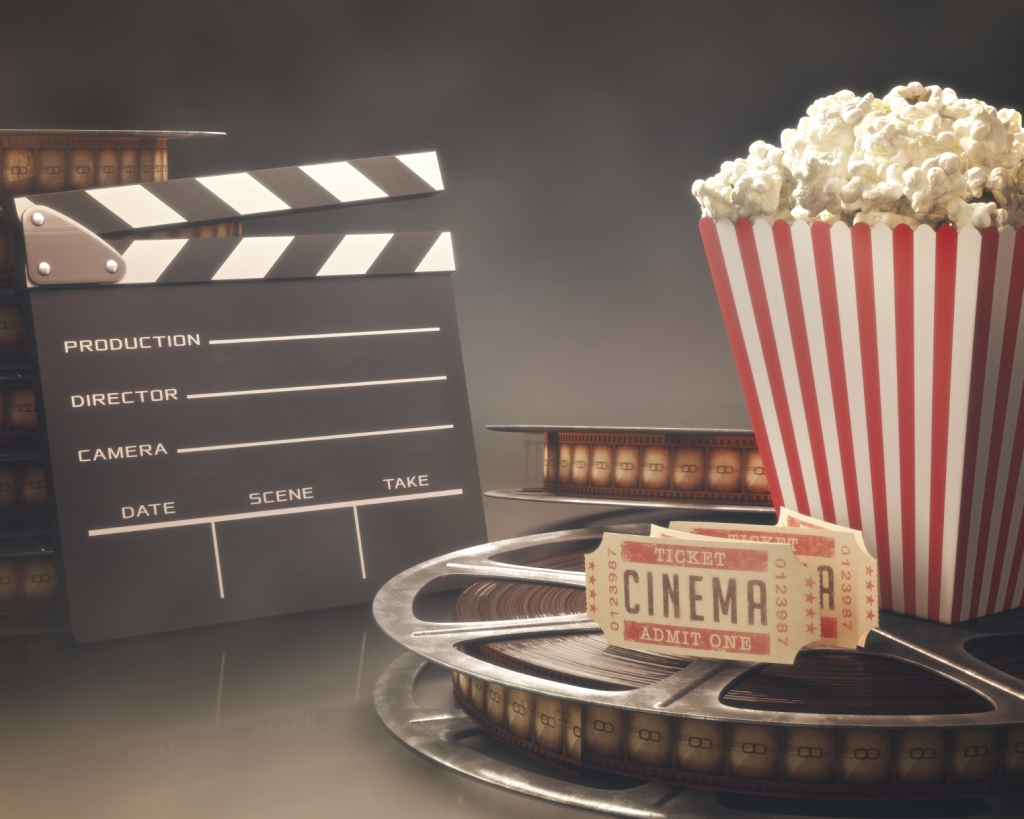 Objects related to the cinema on reflective surface