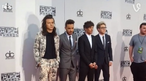 Harry Styles controversial floral suit has left many fans questioning his fashion sense