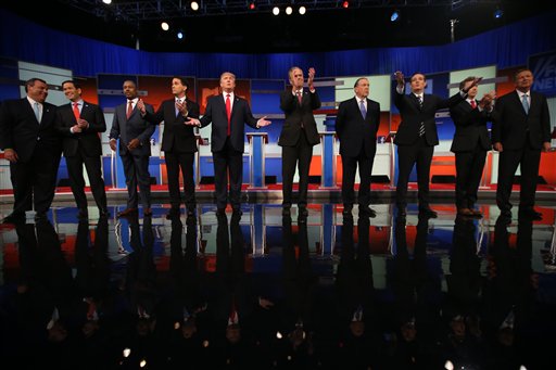 Republican presidential candidates from left Chris Christie Marco Rubio Ben Carson Scott Walker Donald Trump Jeb Bush Mike Huckabee Ted Cruz Rand Paul and John Kasich take the stage for the first Republican presidential debate at the Quicken Loa