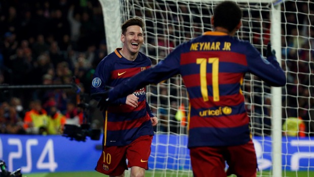 Lionel Messi celebrates scoring the fifth goal for Barcelona with Neymar