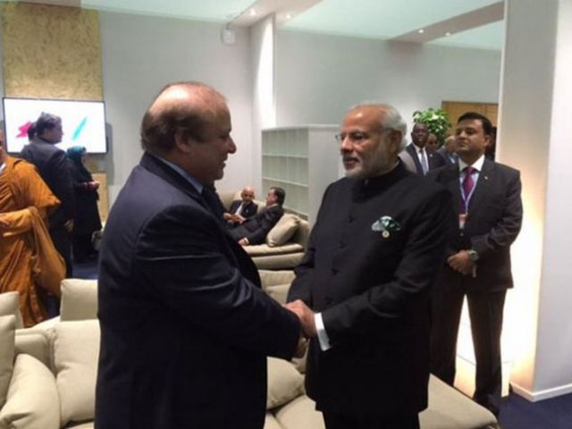 Prime Minister Nawaz Sharif shakes hands with Indian Prime Minister Narendra Modi in an informal meeting at the UN climate summit in Paris