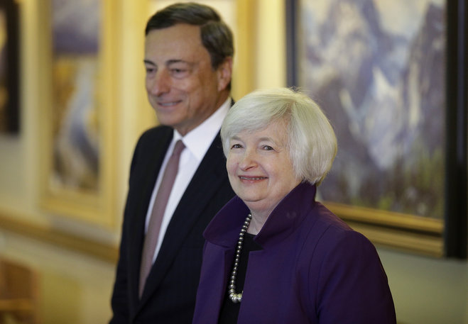 Janet Yellen right and European Central Bank President Mario Draghi walk together during the Jackson Hole Economic Policy Symposium at the Jackson Lake Lodge in Grand Teton National Park near