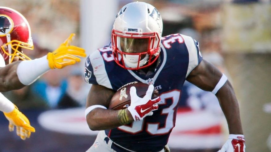 FOXBOROUGH MA- NOVEMBER 8 Patriots player Dion Lewis was chased by Washington's Ricky Jean Francois in the first half. The New England Patriots hosted the Washington Redskins in a regular season NFL football game at Gillette Stadium Sunday Nov