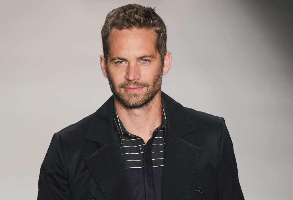 Actor Paul Walker walks the runway at the Samuel Cirnansck show during Sao Paulo Fashion Week Summer