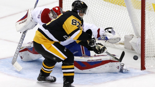 Pittsburgh Penguins&#39 Sidney Crosby backhands