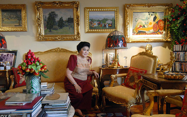 Former first lady Imelda Marcos is seen in her apartment in Manila with a of paintings including a Picasso seen at upper right