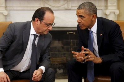 President Obama talks with President François Hollande during a bilateral meeting at the Oval Office of the White House